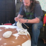 Sean knitting
